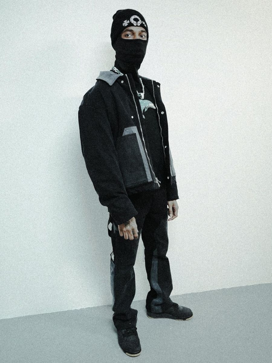Key Glock Wearing a Nahmias Workwear Outfit With Jordan x KAWS Sneakers