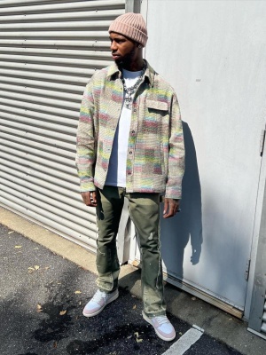 Key Glock Wearing A Pink Ribbed Beanie With A Palm Angels Patchwork Plaid Shirt Gallery Dept Olive Pants And Jordan 1s