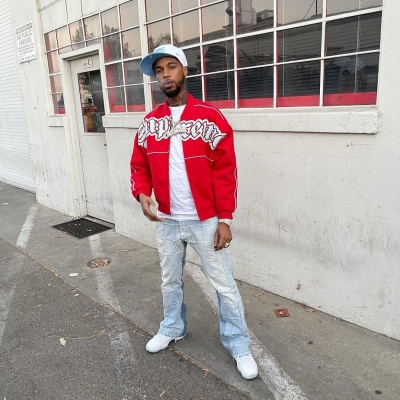 Key Glock Wearing A Supreme Bomber Jacket With Gallery Dept Jeans And Jordan 11 Sneakers