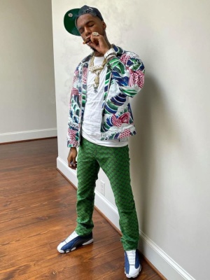 Key Glock Wearing A Supreme Deniim Jacket With Gucci Pants And Jordan Sneakers