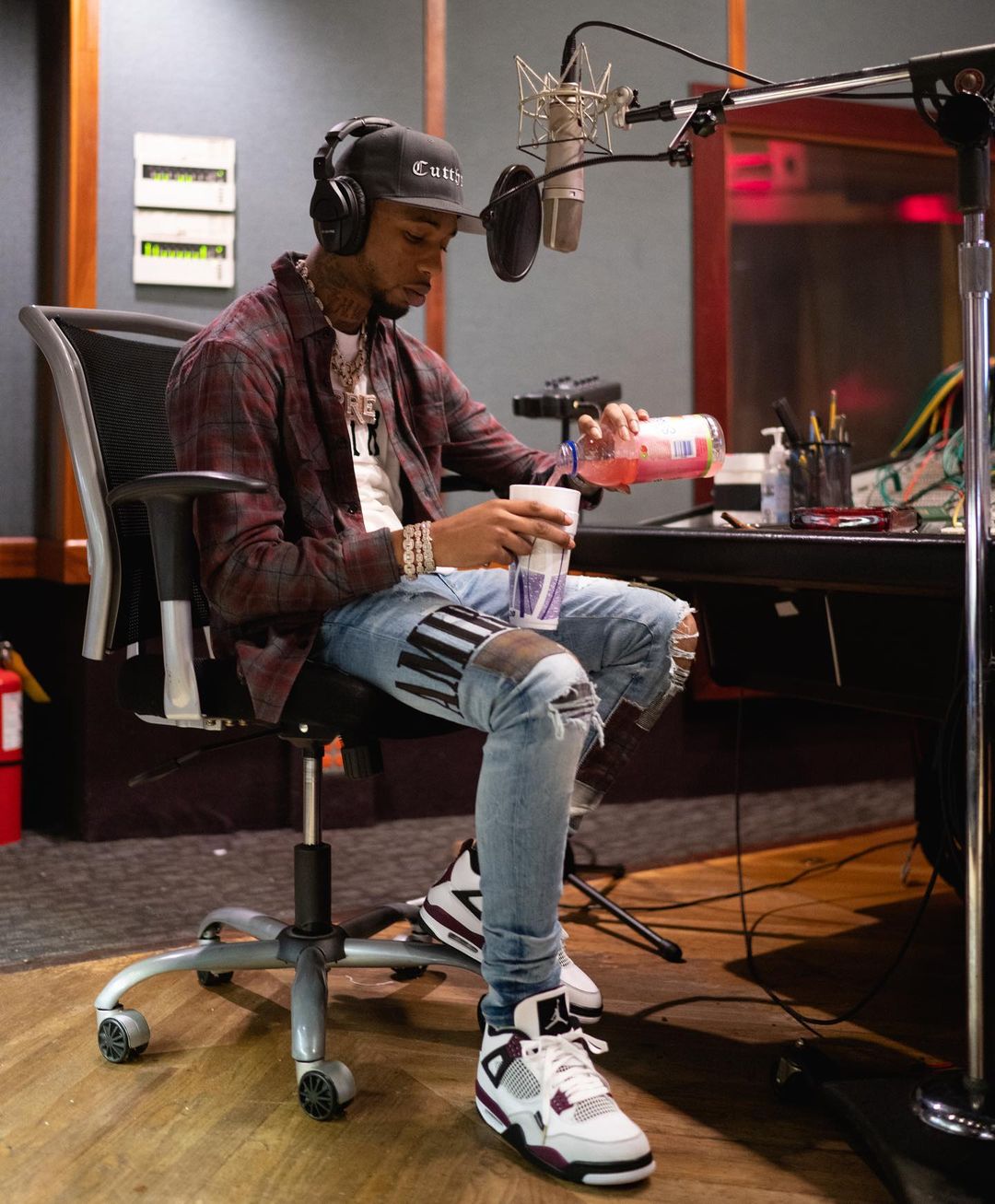 Key Glock Hits The Studio In An Amiri Flannel, Tee, & Jeans With PSG x Jordans