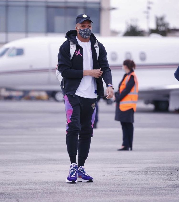 Kylian Mbappe Wearing a Jordan x PSG, & Nike x Sacai Outfit