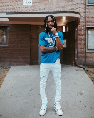 King Von Wearing A Lv Cloud Tee And Matching Sneakers With Amiri Jeans