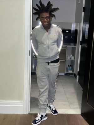 Kodak Black Wearing A Grey Moncler Track Jacket And Trackpants With Prada Navy Patent Sneakers