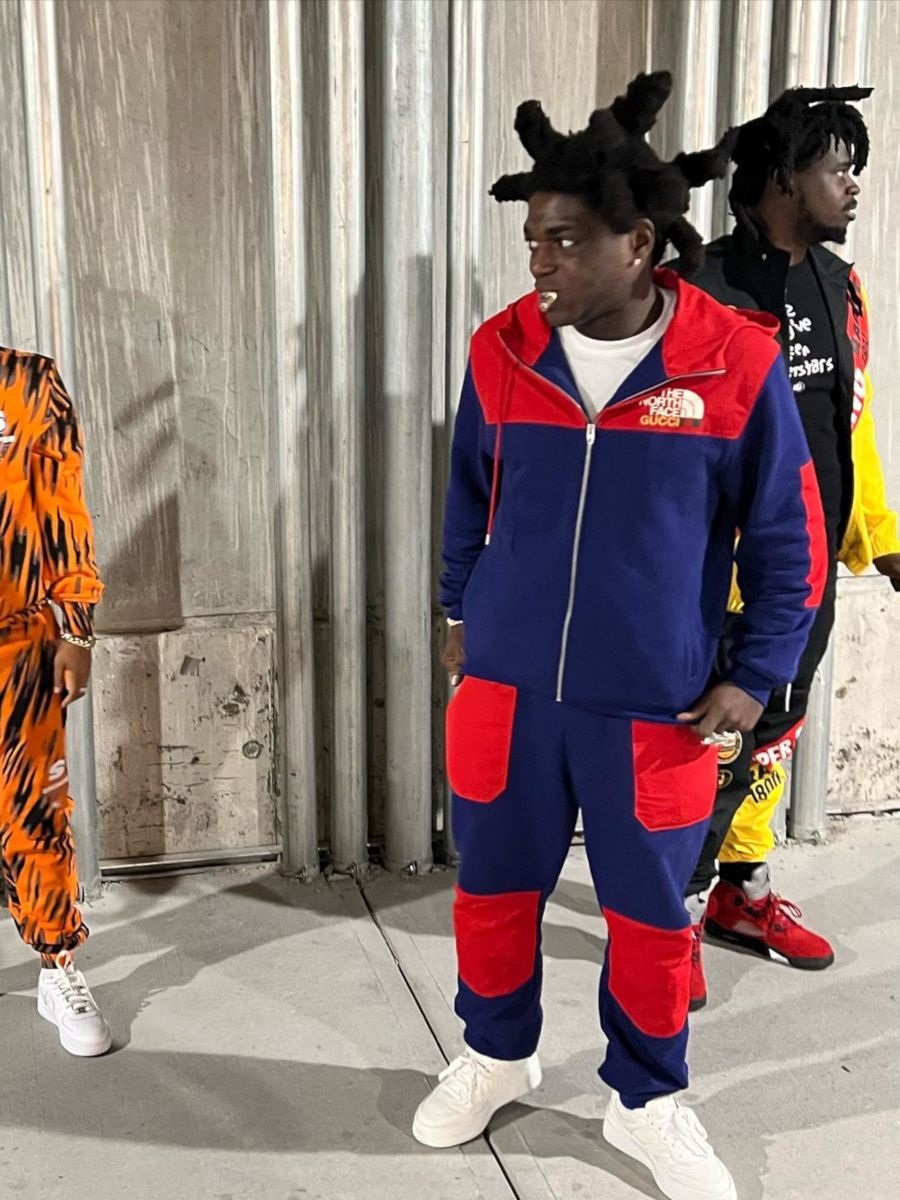 Kodak Black Wearing a Gucci x The North Face Blue Hoodie & Joggers With Gucci Low-Tops
