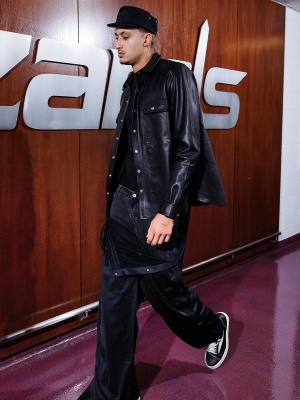 Kyle Kuzma Wearing A Chrome Hearts Hat Rick Owens Leather Shirt Black Layered Pants And Rick Owens Sneakers