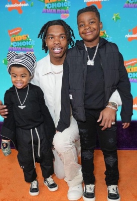 Lil Baby Attends The 2023 Kids Choice Aware In A Louis Vuitotn Jacket White Jeans And Rick Owens Sneakers