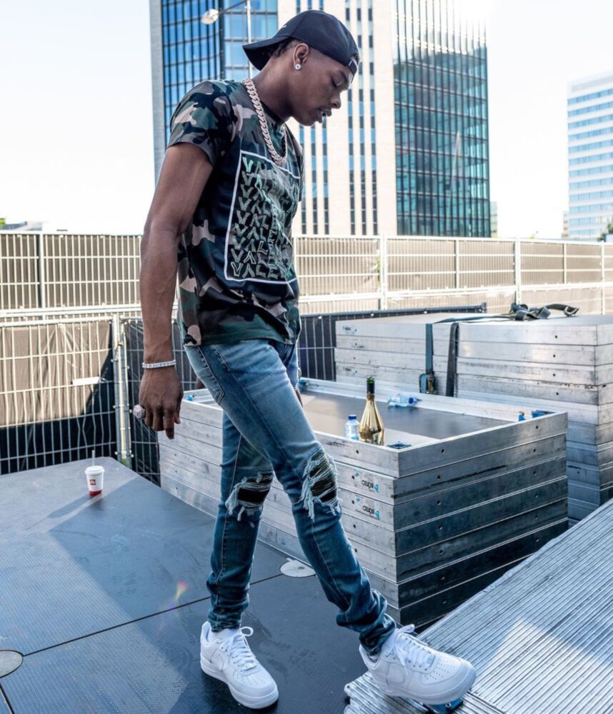 Lil Baby Preforms In Amsterdam, NL In a Diesel Hat, & Valentino Camo T-Shirt