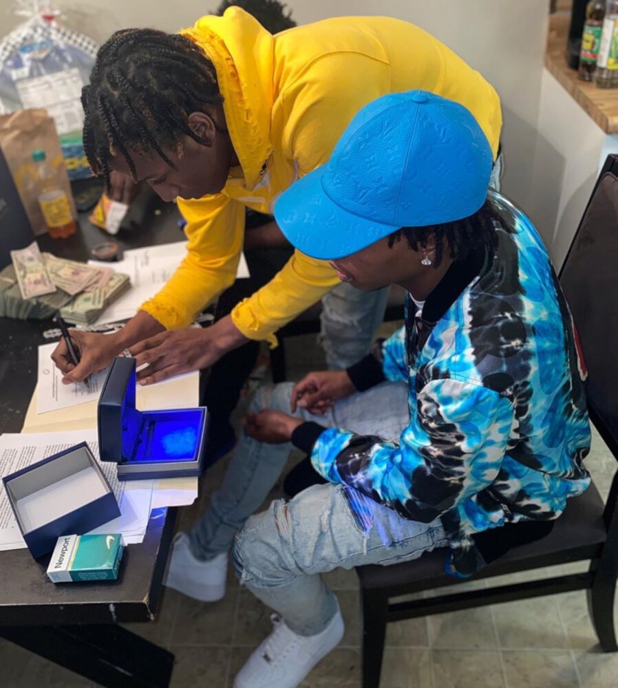 Lil Baby Shares Lil Kee Signing In Louis Vuitton & Amiri On Instagram