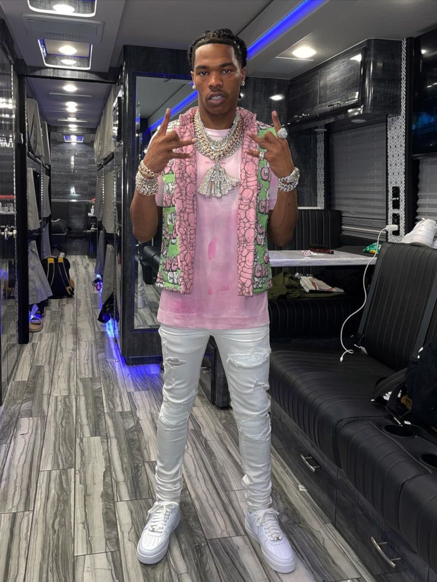 Lil Baby Wearing a CDG x KAWS Vest With an ALYX Studios Tee & Amiri Jeans