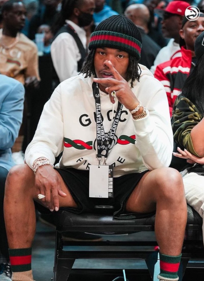 Lil Baby Sits Courtside In a Throwback Full Gucci Outfit