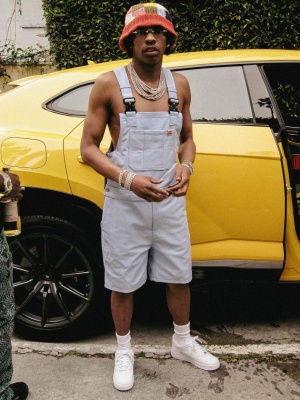 Lil Baby Wearing A Marni Bucket Hat With Homme Femme Leather Overalls Shorts And Nike Af1s