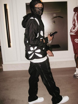 Lil Baby Wearing A Post Archive Faction Lace Balaclava With A Black Cut Out Jacket And Full Zip Pants