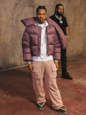 Lil Baby Wearing A Rick Owens Purple Puffer White Tee Pink Pants And Purple Boots