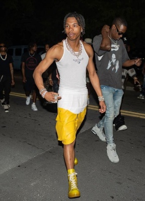 Lil Baby Wearing A Rick Owens Tank Top Yellow Leather Shorts And Yellow High Top Sneakers Outfit