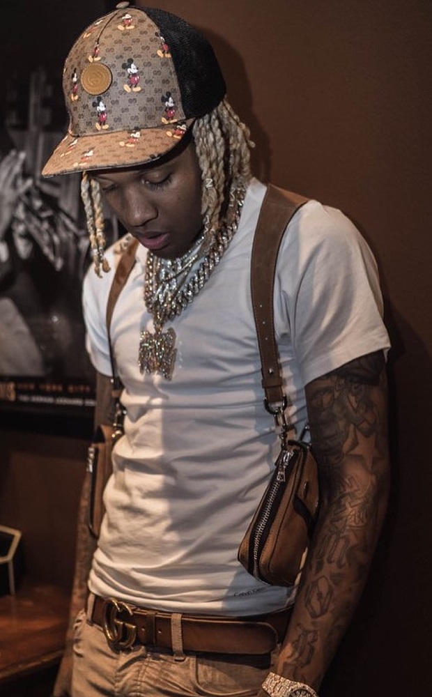 Lil Durk Wearing a Gucci Belt and Disney Collab Hat With an Amiri Harness Bag