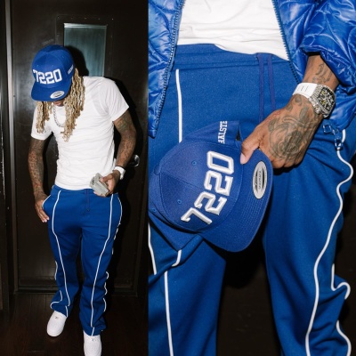 Lil Durk Wearing A Louis Vuitton Blue Lvse Padded Jacket With A White Tee Amiri Royal Blue Western Trackpants And Nike Air Force 1 Low Top Sneakers