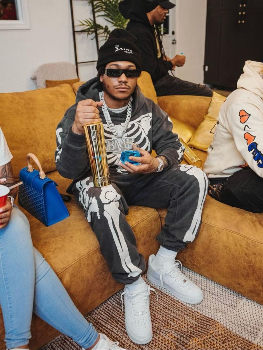 Lil Meech Wearing a 'Saint Room' Hat With Matching Skeleton Sweats Outfit