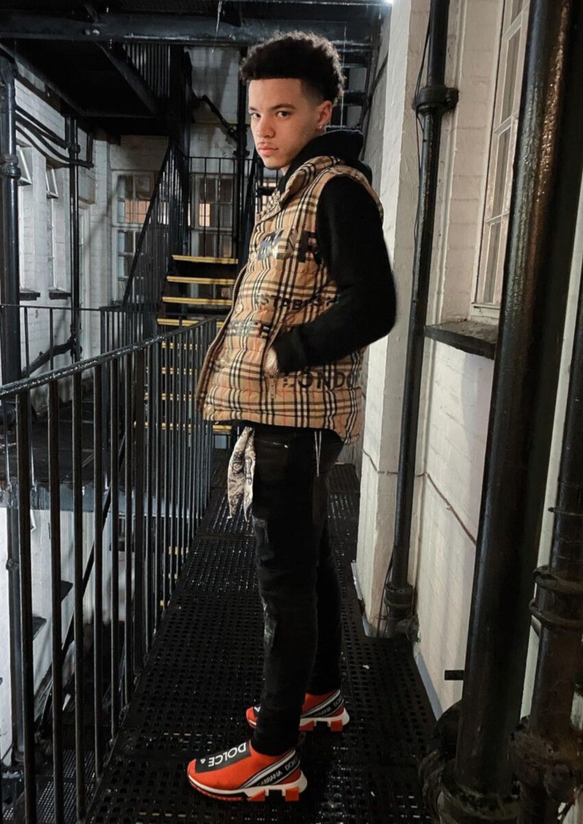 Lil Mosey Wearing a Burberry Puffer Vest With D&G Slip-On Sneakers