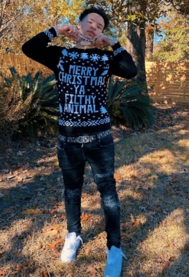 Lil Mosey Wearing A Home Alone Christmas Sweater With A Dior Belt And Amiri Jeans