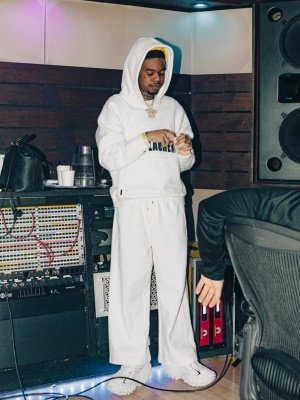 Lil Poppa Wearing A Ysl White Logo Hoodie White Trackpants And Balenciaga Bouncer Sneakers