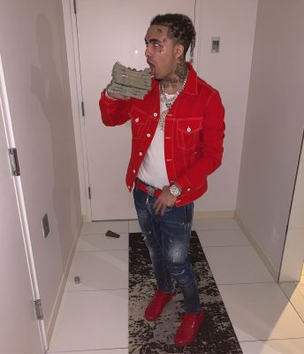 Lil Pump Instagram Post Wearing A Red Denim Jacket With Blue Jeans And Red Leather Low Top Sneakers
