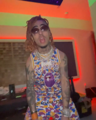 Lil Pump Wearing A Bape La Exclusive Camo Basketball Jersey And Shorts