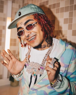Lil Pump Wearing A Bape Panel Hat And Bape Camo Hoodie With Logo Patch