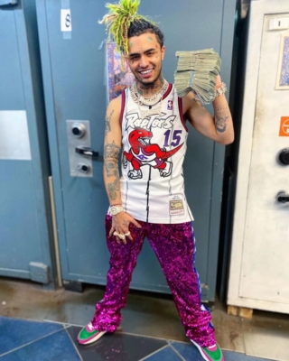 Lil Pump Wearing A Vince Carter Jersey Purple Sequin Pants And Nike X Sacai Waffle Racers
