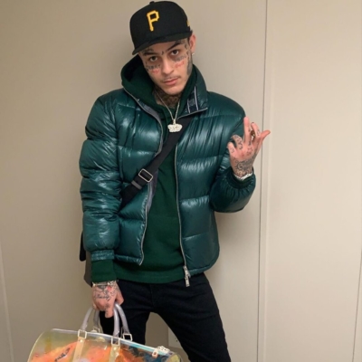 Lil Skies Gives The Finger In Armani Puffer And Louis Vuitton Transparent Duffle Bag