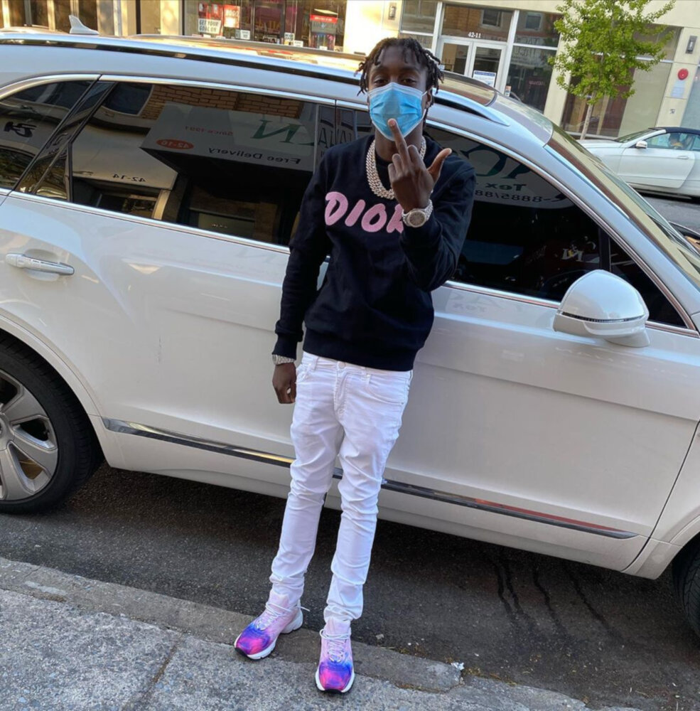 Lil Tjay Wearing A Dior X Kaws Sweatshirt And Tie Dye Sneakers Inc Style