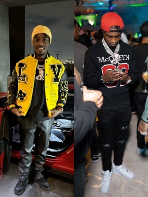 Lil Tjay Wearing A Celine Yellow Logo Beanie With A Louis Vuitton Varsity Jacket And Black Suede Sneakers