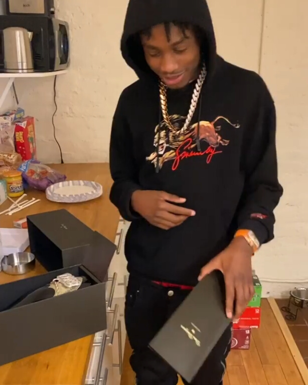 Lil TJay Wearing a Givenchy 'Leo' Hoodie With Amiri 'MX2' Jeans