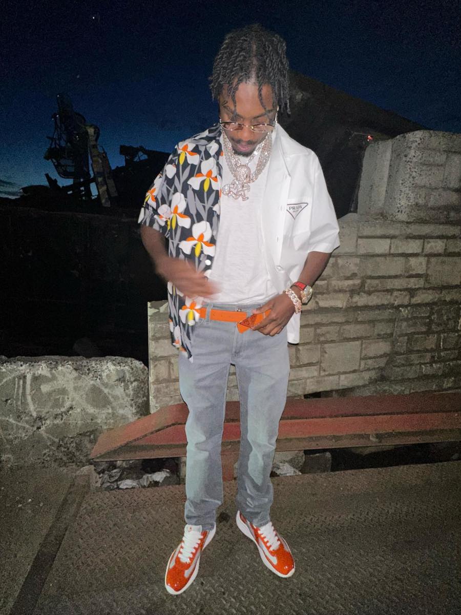 Lil TJay's Orange Themed Prada Shirt, Belt, and Patent Sneakers Outfit