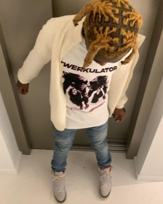 Lil Uzi Ver Wearing A City Girls Merch Tee With A Louis Vuitton Cardigna And Nike X Yeezy Sneakers