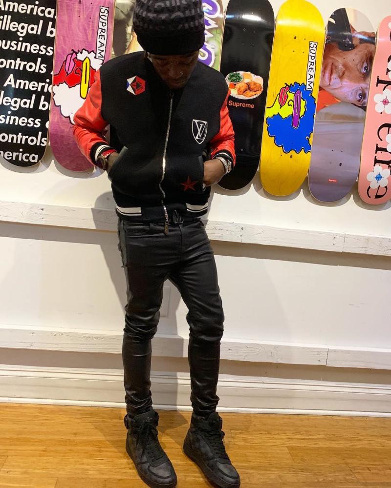 Lil Uzi Vert Wearing a Louis Vuitton Varsity Jacket & High-Top Sneakers