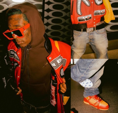 Lil Uzi Vert Wearing A Louis Vuitton Zip Hoodie Belt And Sneakers With A The Weeknd Superbowl Jakcet And Goyard Bag