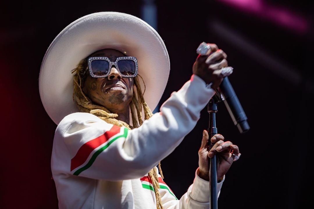 Lil Wayne Performs at Gov Ball 2019 In a Gucci Cowboy Hat, Sweatshirt, & Sunglasses