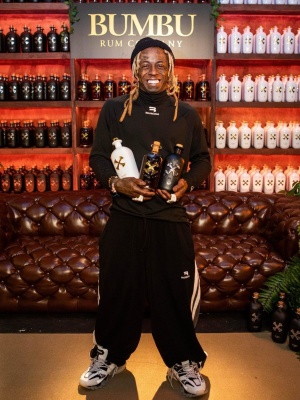 Lil Wayne Wearing A Balenciaga Sporty B Mock Cycline Jersey With Black Sporty B Trackpants And Track Sneakers