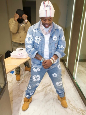 Lil Zay Osama Wearing A Moncler Beanie Denim Tears Jacket And Jeans And Timberland Boots