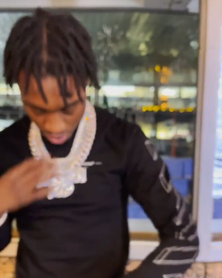 Lill Tjay Showing Off His Ice In An Off White Long Sleeve Black 3d Lines T Shirt