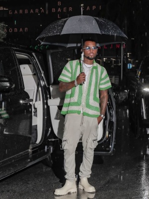 London On The Track Wearing A Bode Green Crochet Shirt With Rick Owens Cargo Pants And Bottega Veneta Boots