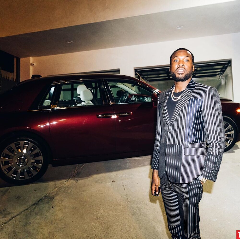 Meek Mill Shows Off His Rolls In Alexander McQueen Suit & Supreme Leather Jacket