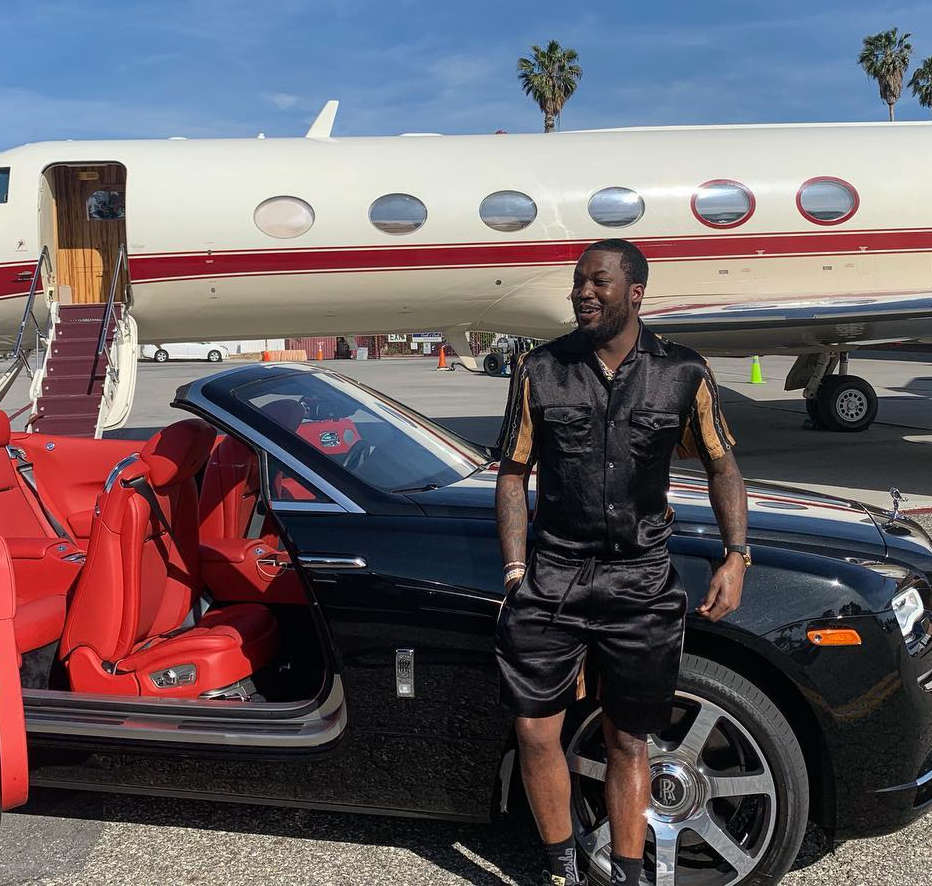 Meek Mill Wearing a Black Gucci Bowling Shirt and Black Gucci Shorts Next  To A Drop Top Rolls Royce