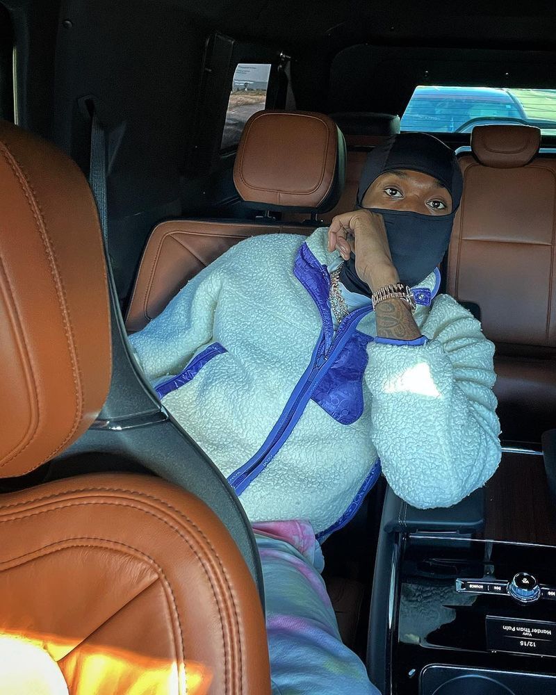 Meek Mill Relaxes In a Black Ski Mask & Dior Sherpa Fleece Jacket |  Incorporated Style