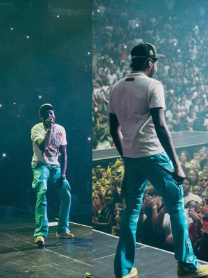 Meek Mill Wearing A Louis Vuitton Floral Tee With Amiri Cargo Pants And Yellow Sneakers
