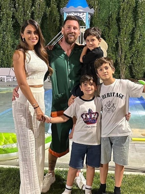 Messi Wearing A Gucci Green Silk Shirt And Shorts With White Low Top Sneakers