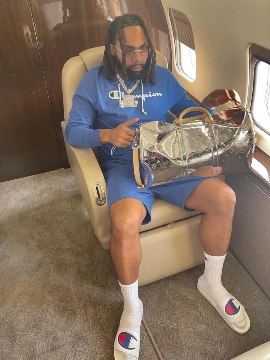 Money Man Wearing Champion Sweats & Slides With a Louis Vuitton Bag