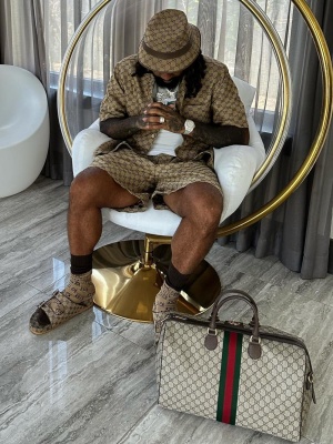 Money Man Wearing A Gucci Gg Bucket Hat Shirt Shorts Socks And Slides