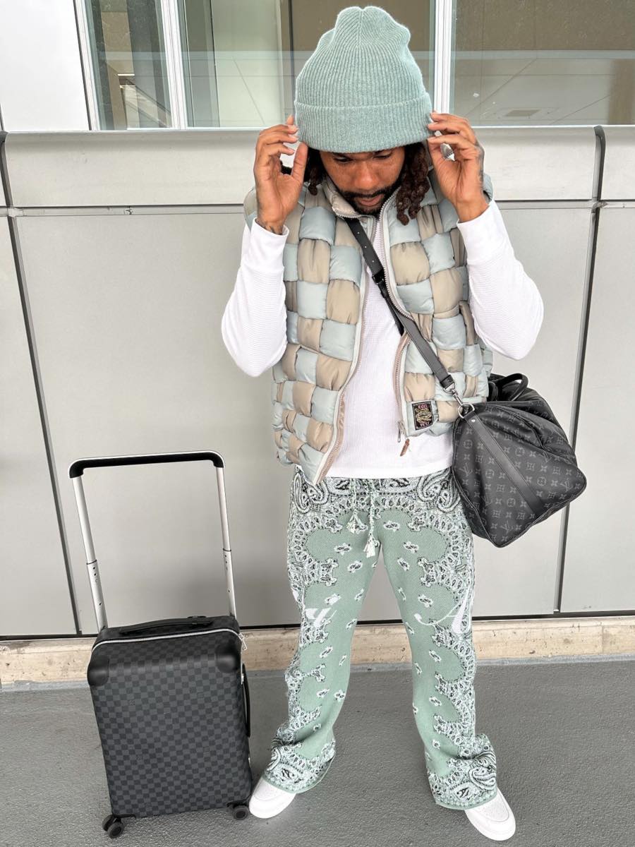 Money Man: KAPITAL Woven Vest, Green Bandana Pants & Louis Vuitton Bags
